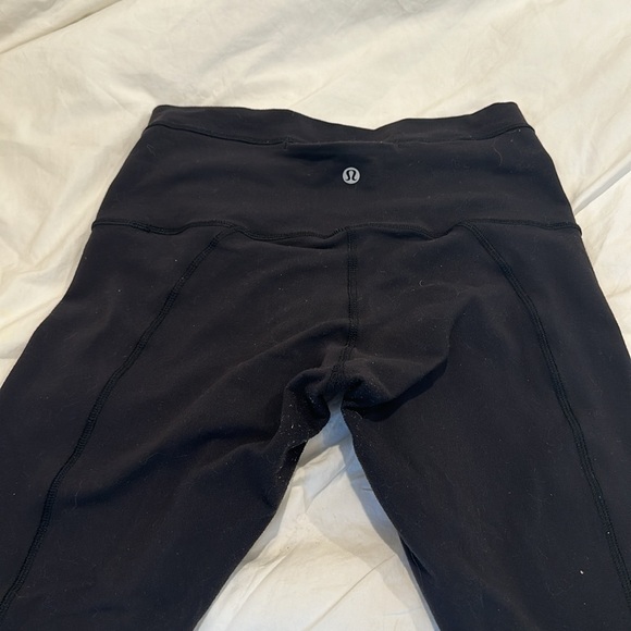 Black Lululemon Athletica High Rise Criss Cross Ankle Leggings - Picture 8 of 8